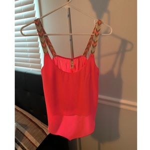 Pink tank top with super cute strap details!